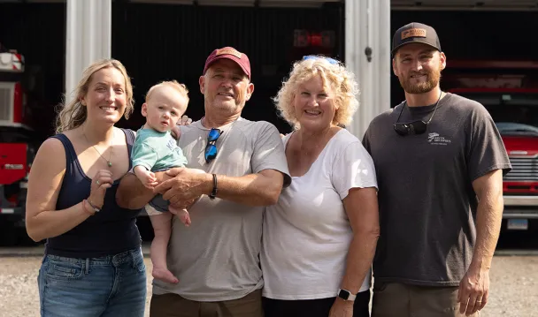 The Wilcox family, owners of Wilcox Tree Experts, in front of their business in Old Lyme, CT