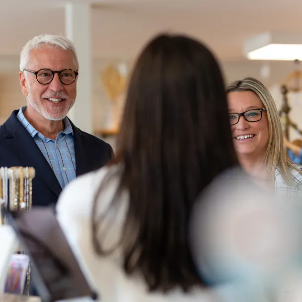 Essex Bank officers visit Caroline Olson at Pearls & Plaid