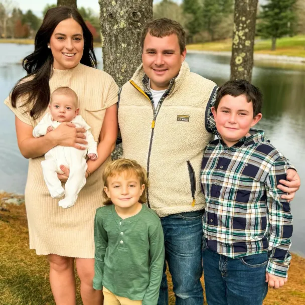 Caroline Olson and her family near the water