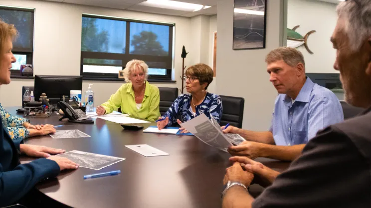 Essex Bank President Diane Arnold with leadership from Blast All