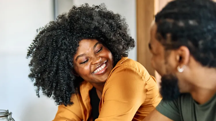 Woman laughing with her boyfriend